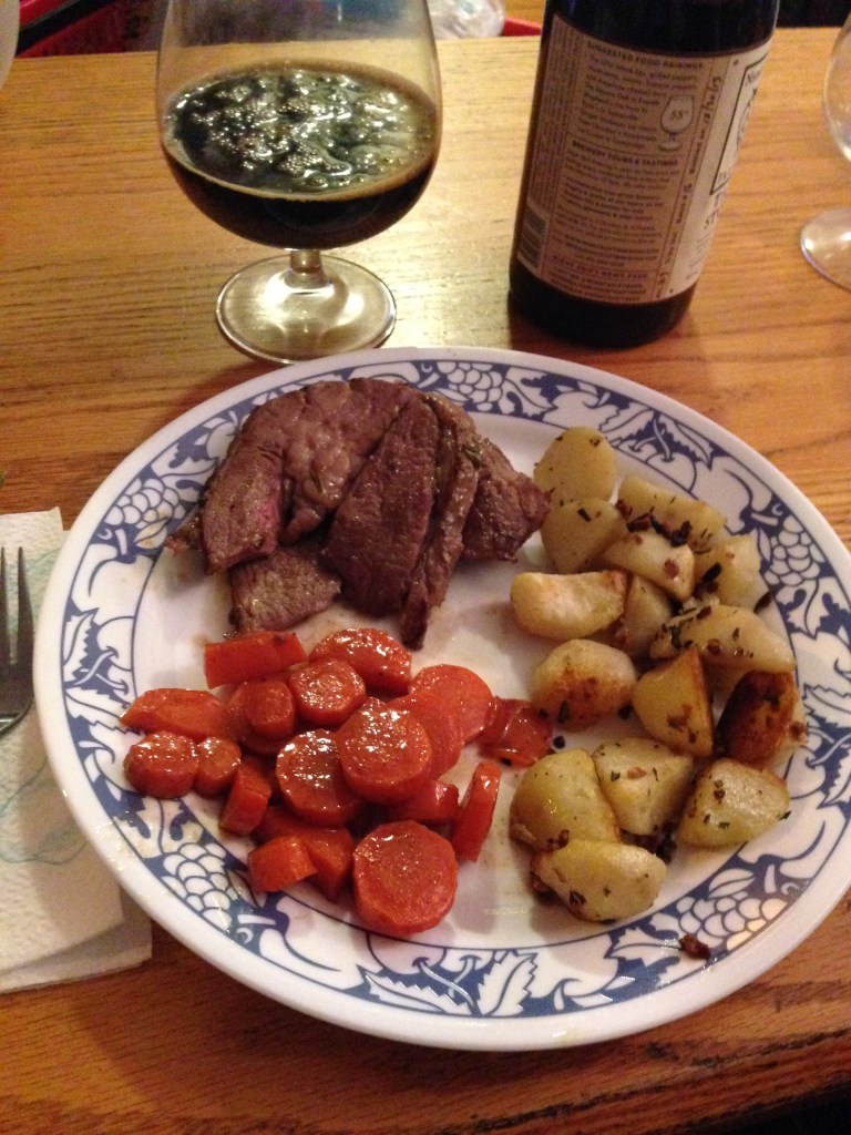 Roast leg of lamb, oven potatoes, and brown sugar and butter glazed carrots.